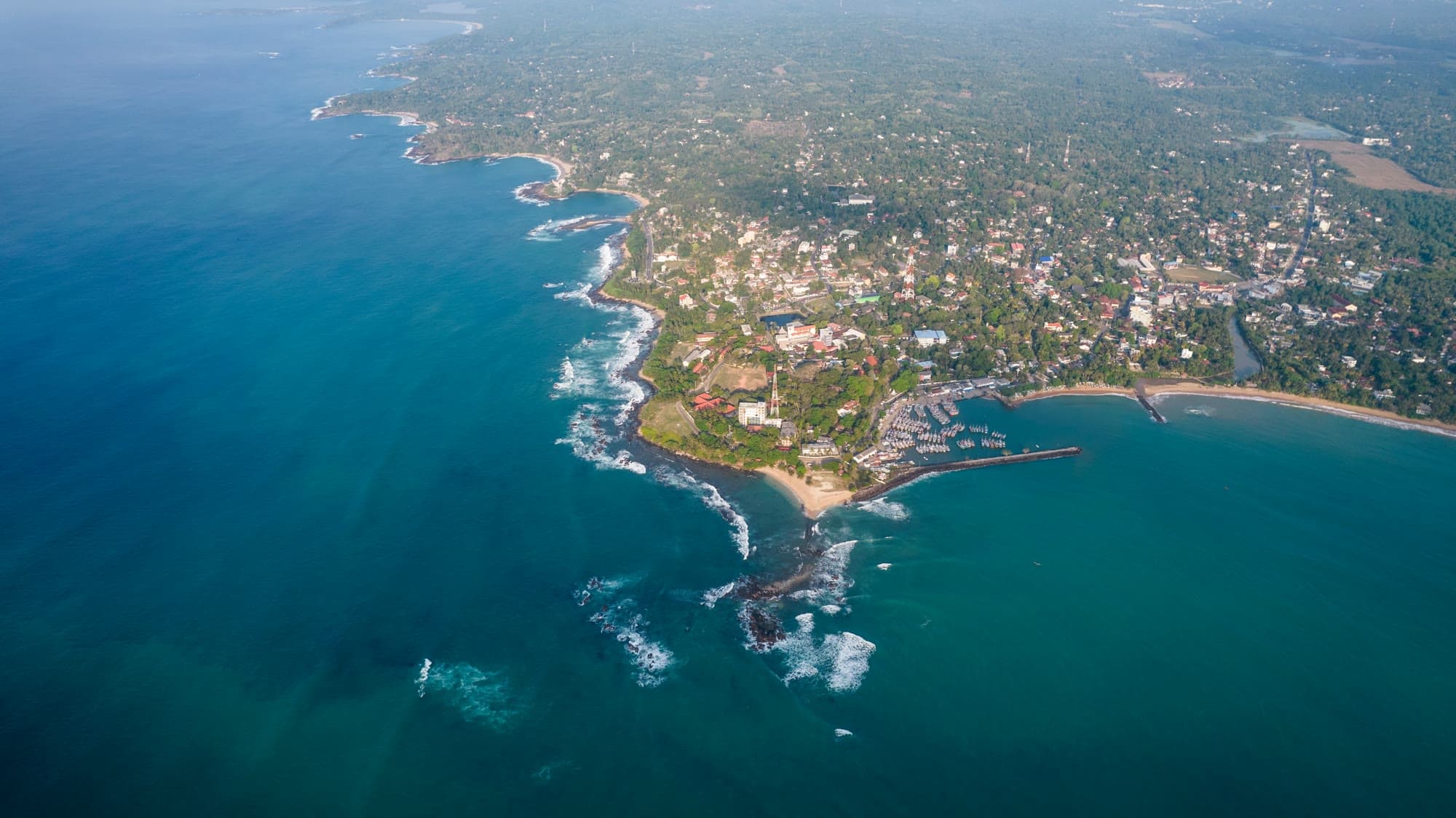 Aerial view of Sri Lanka's south coast — turquoise ocean and Galle harbor